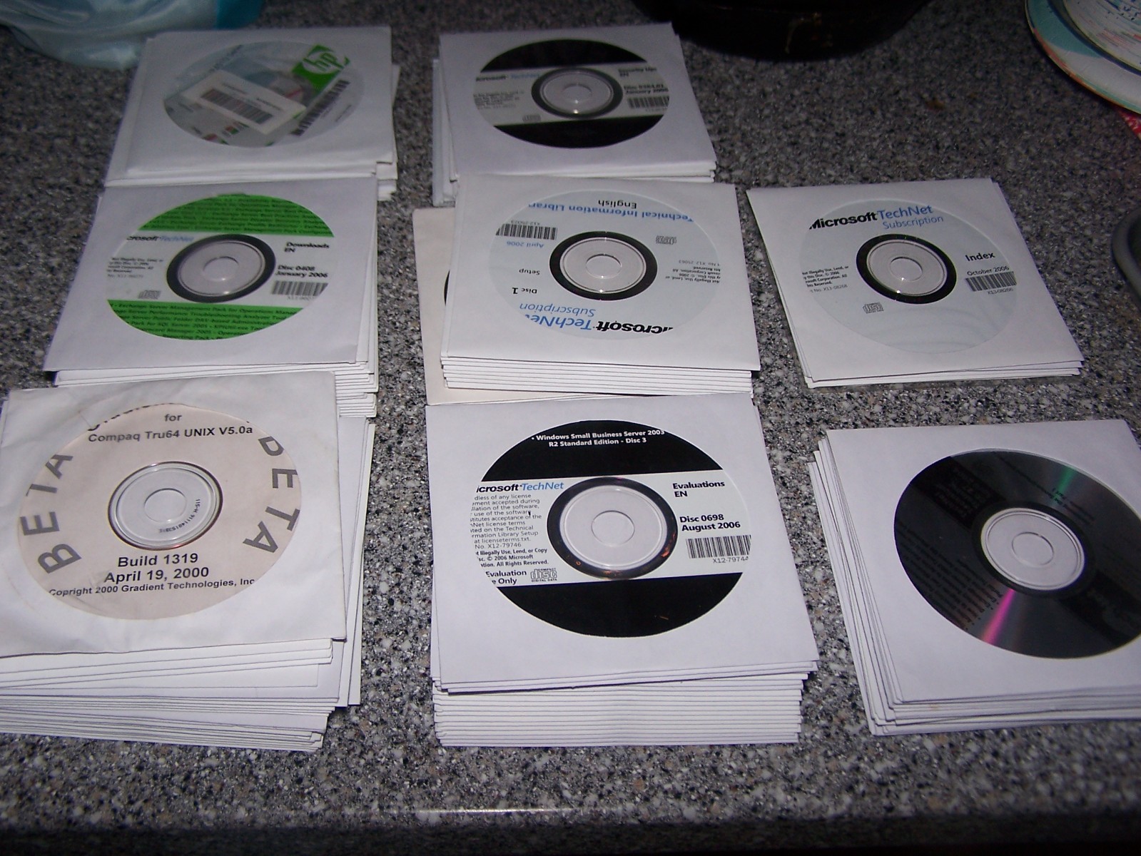 Box of about 150 Microsoft Technet and other CD's, DVD's - SOLD AS IS