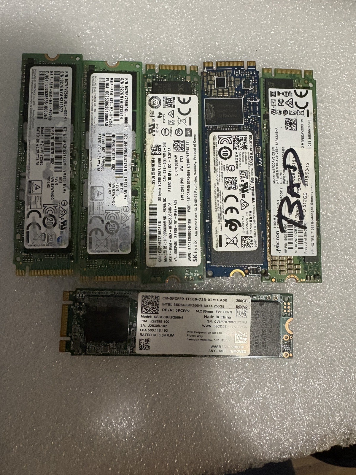 Lot of 6 256GB /512 NVMe  SSD  drives No READ for parts only