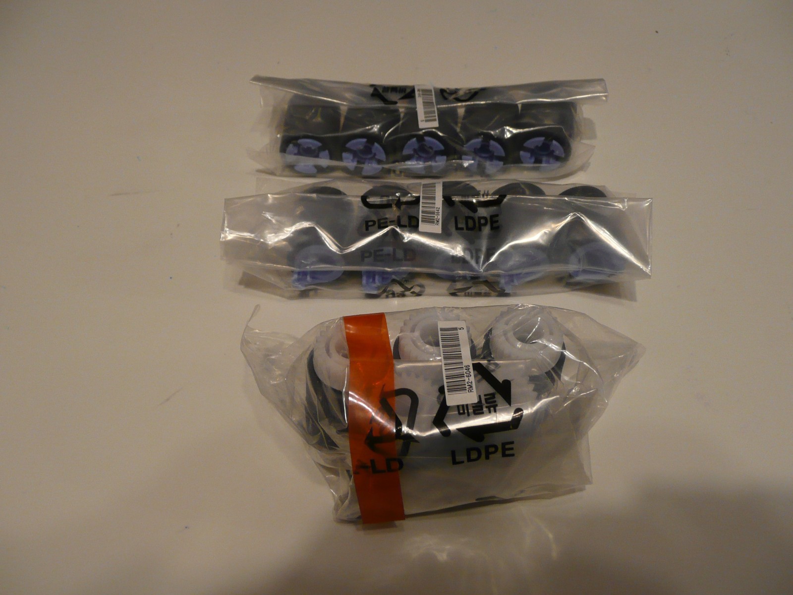 NEW Genuine HP RM2-5642-000 5-pack (2) and RM2-6046-000 5 pack (1) Rollers OEM