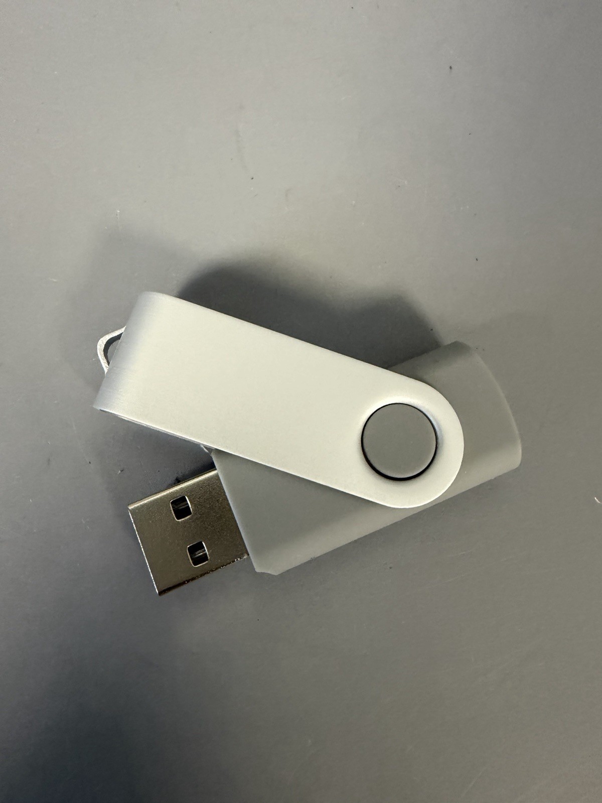 New 1G USB drives box of 10 Gray, swivel open, open box