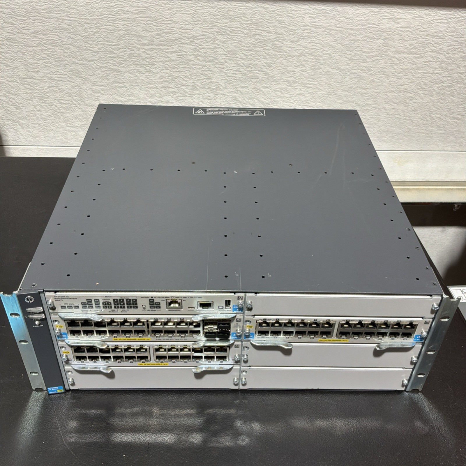 HP J9850A Switch Chassis w/ 2 x J9986A 1 x J9990A 1x J9827A 1x Switches N043