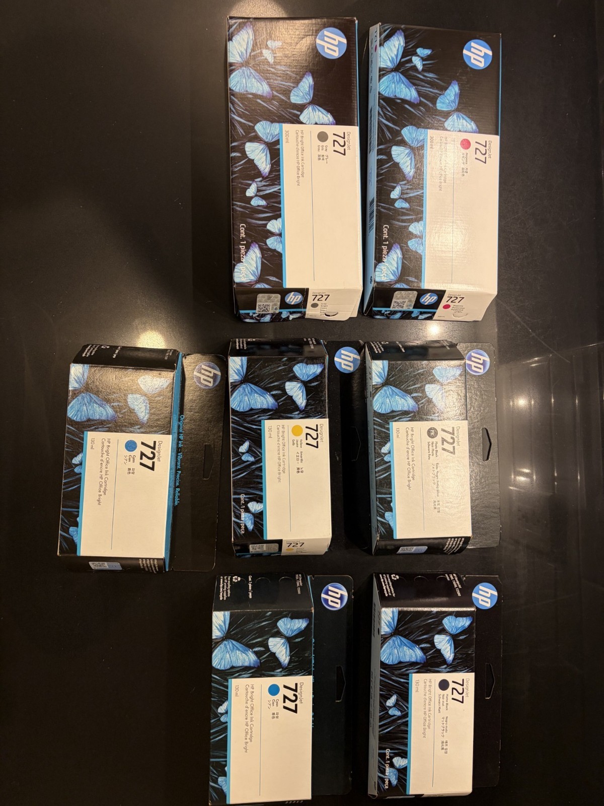 Lot of HP 727 Ink (Two 300ml, Five 130ml)