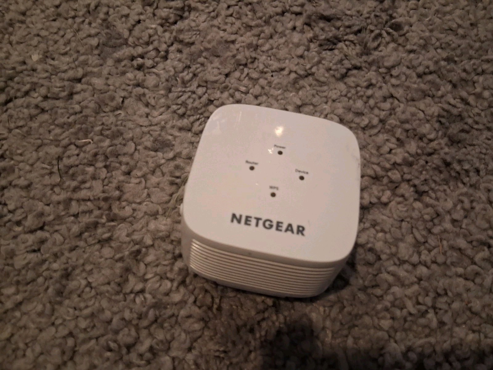 #AI) Netgear EX3110 AC750 WiFi Wall Plug Range Extender and Signal Booster