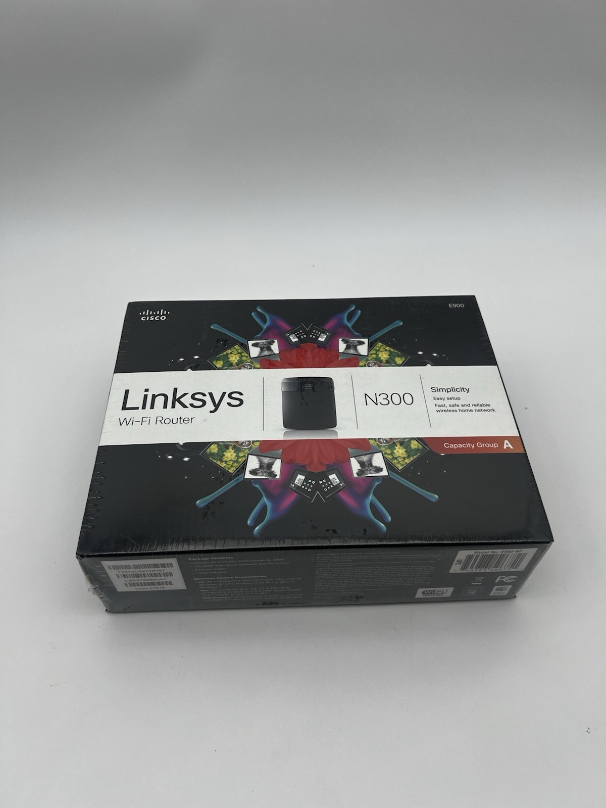 Linksys Model:E900 300 Mbps 4-Port 10/100 Wireless N Router (E900-NP)