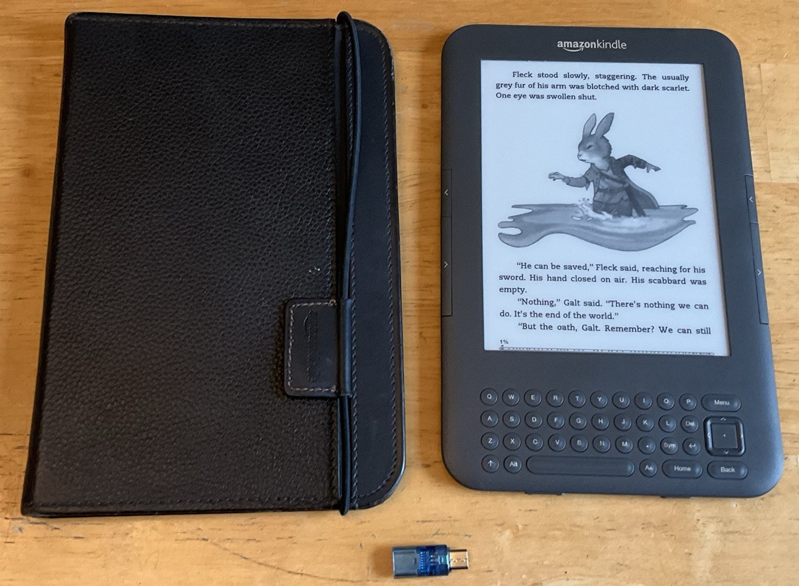 Kindle Keyboard, NEW battery, cover, 1 game, books, great condition. K3 bundle