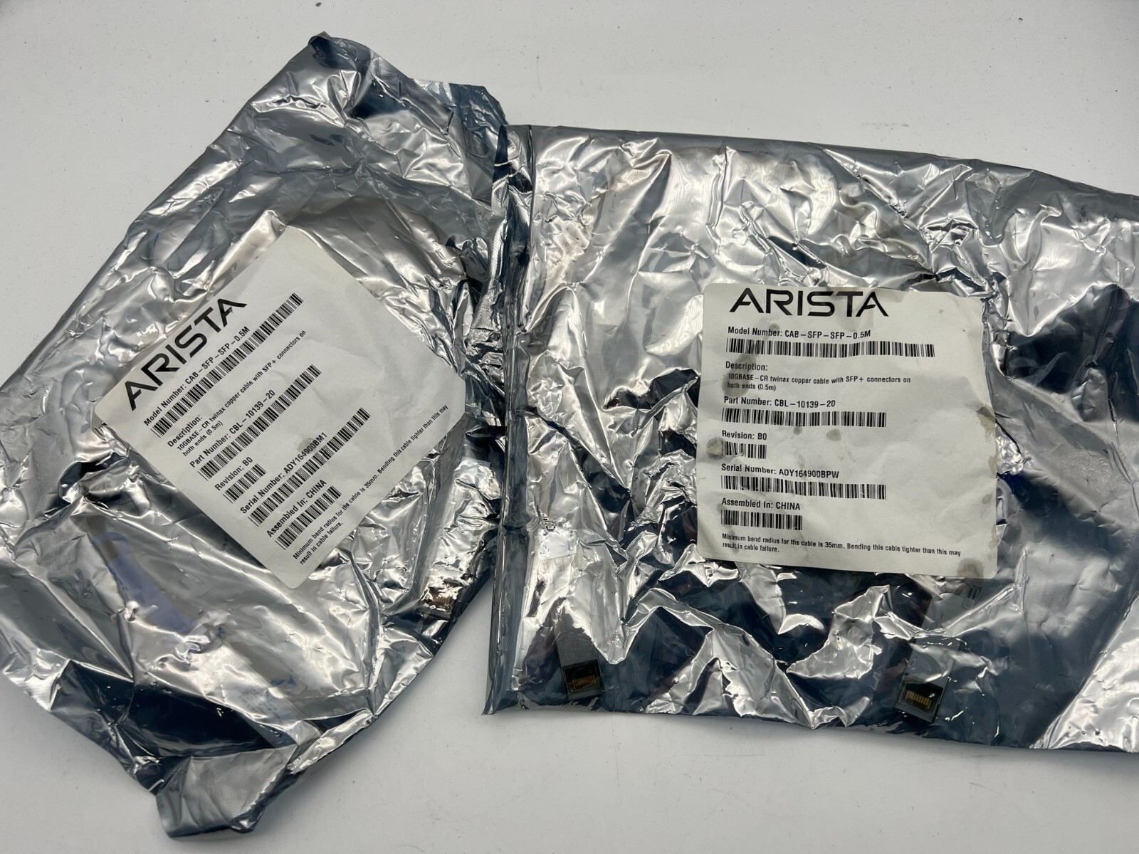 2- Arista CBL-10139-20 10GBase direct attach cable - SFP+ (M) to SFP+ (M) .05m