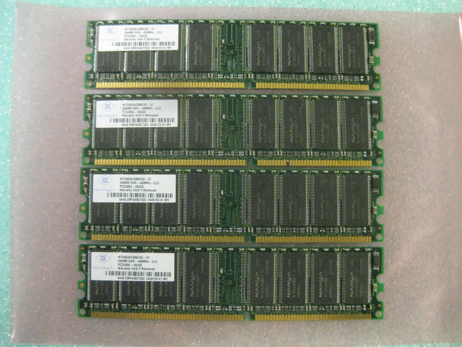 1GB 4 x 256MB Nanya PC3200 DDR-400MHz non-ECC Unbuffered CL3 184-Pin DIMM Memory