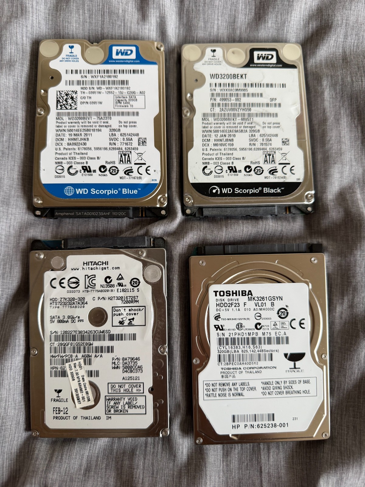2.5" SATA HDD's 320GB - Lot of 4