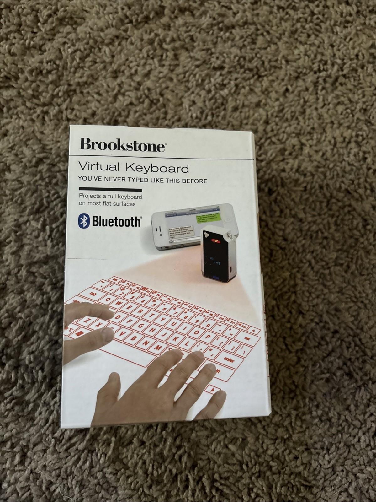 Brookstone CTX (Model: VK200)  BT Virtual Bluetooth Keyboard 