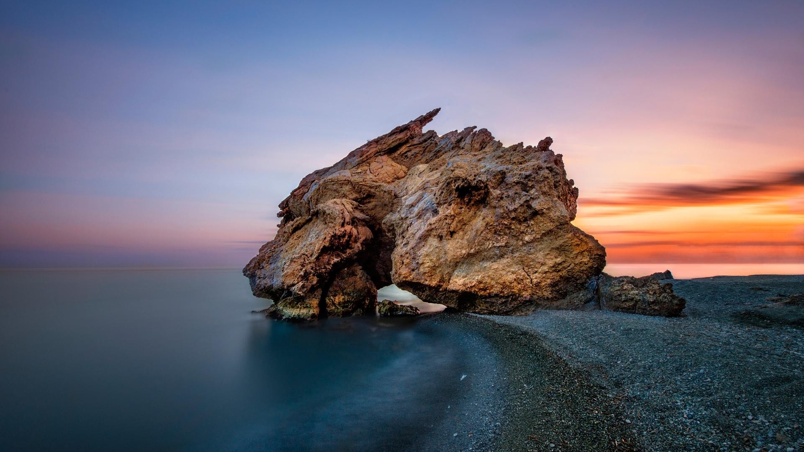 Landscape rocks coast sea orange sky sunset glow water Custom Gaming Mat Desk