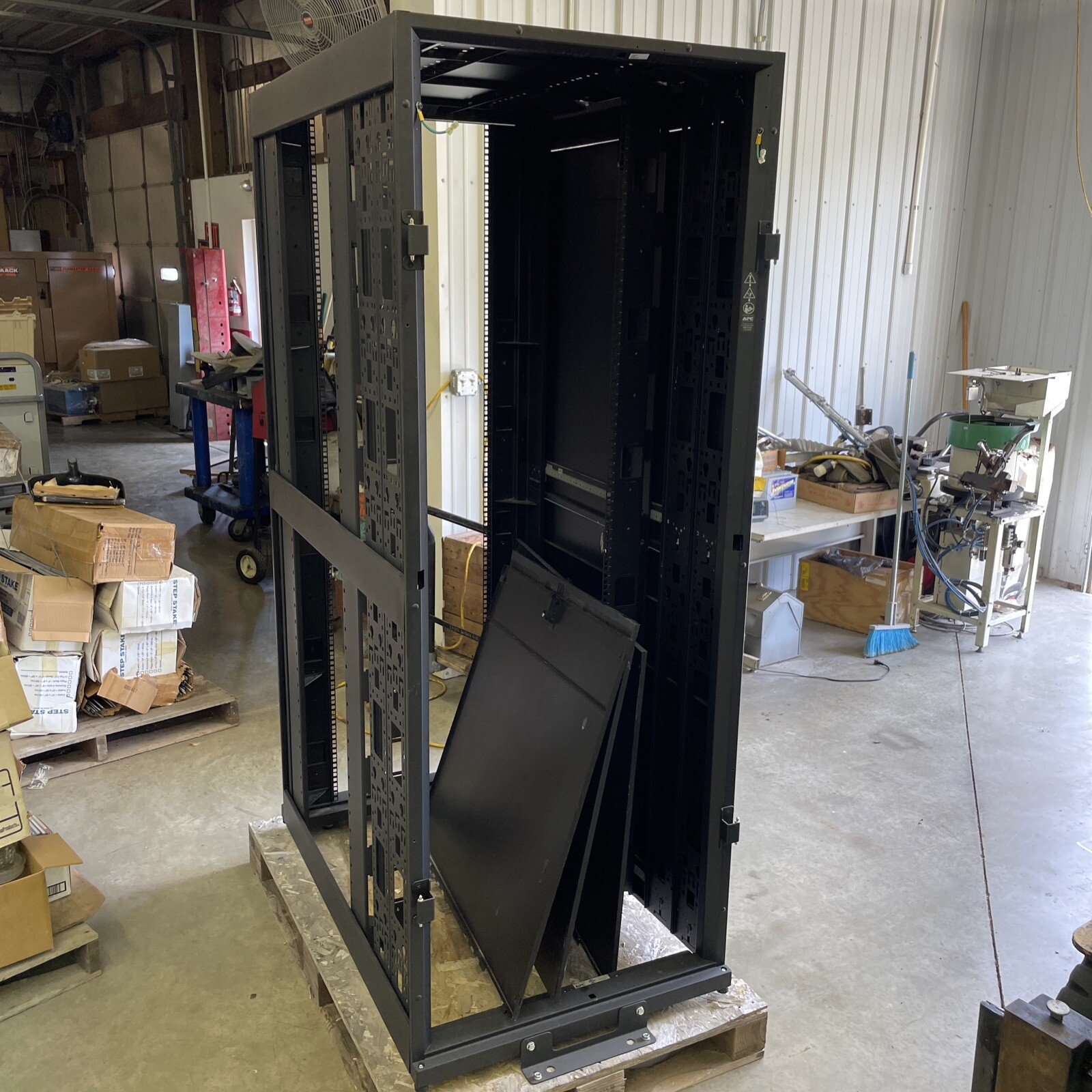 2 APC NetShelter E242296 Server Rack Cabinet Missing Doors And Panels, 29-1/2”