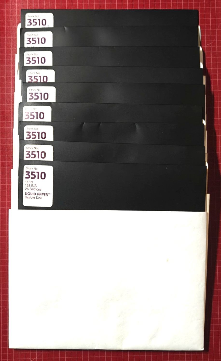 Box of nine- 8" Liquid Paper SS, SD floppy disks
