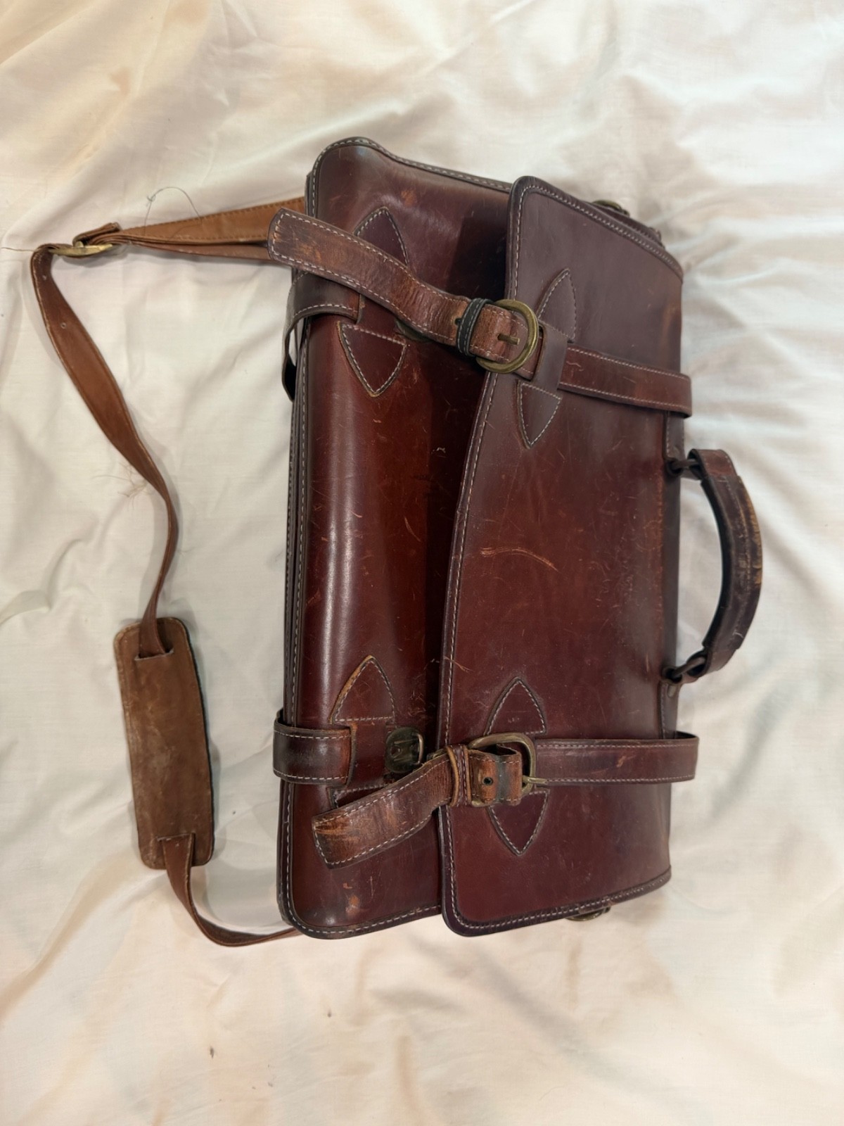 soft side accordion leather briefcase with laptop sleeve used