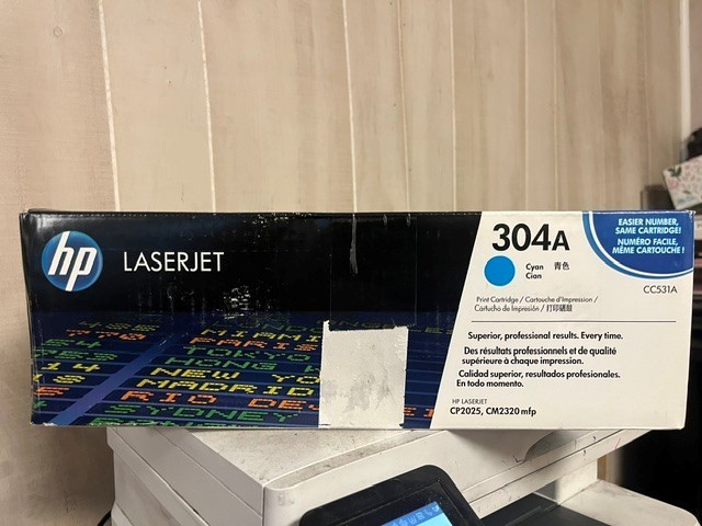 Original HP 304A (CC531A) Cyan Toner Cartridge-sealed box with tears