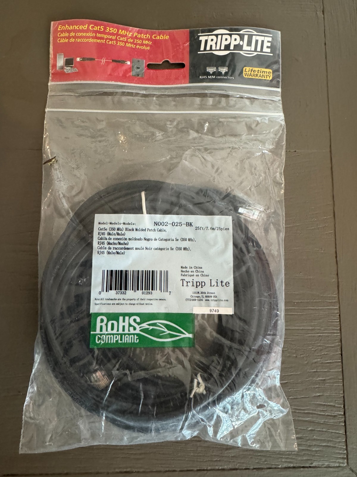 Tripp Lite Cat5e Patch Cable - RJ45 Male -Male  25ft Black N002-025-BK