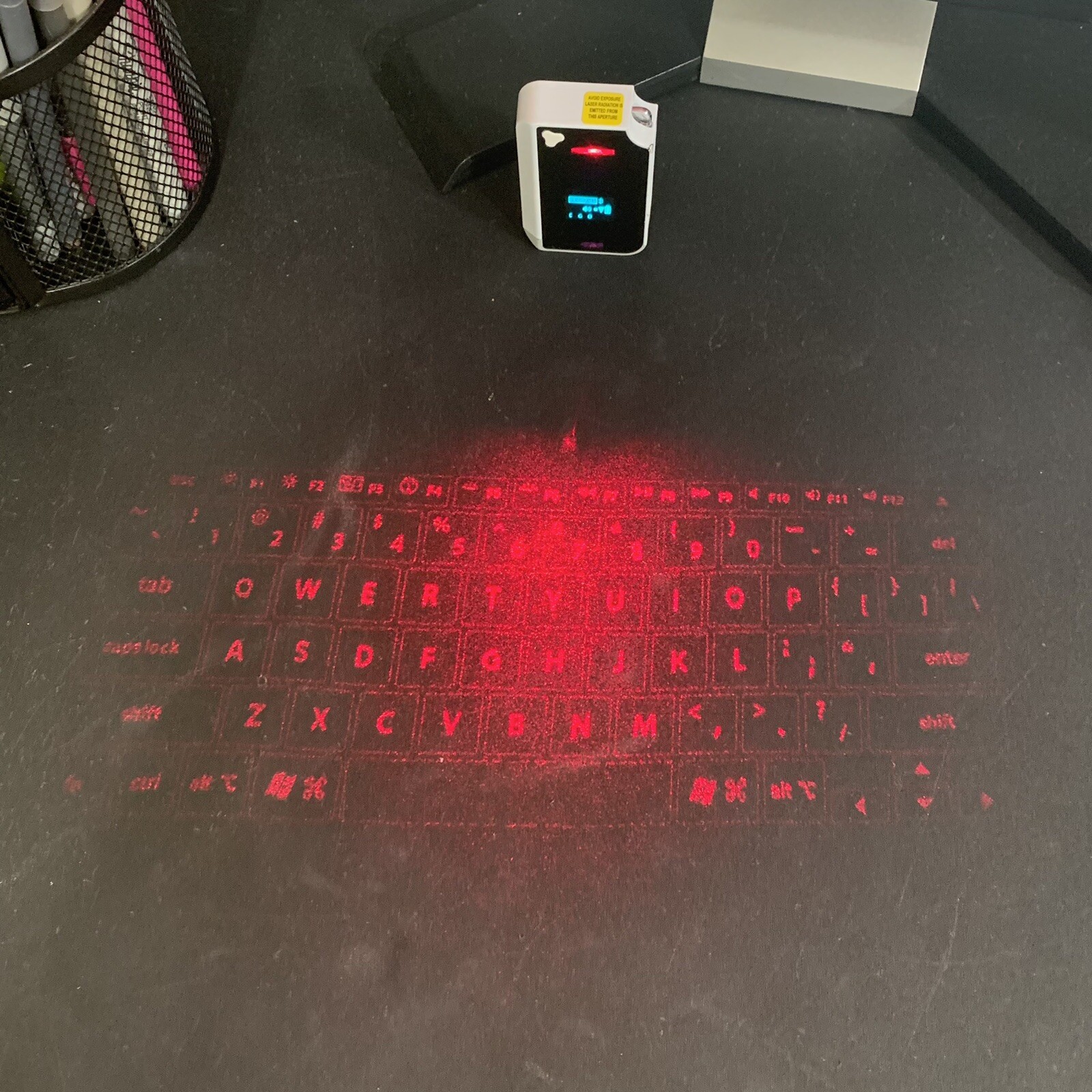 Brookstone CTX (Model: VK200 Keyfob) BT Virtual Bluetooth Keyboard