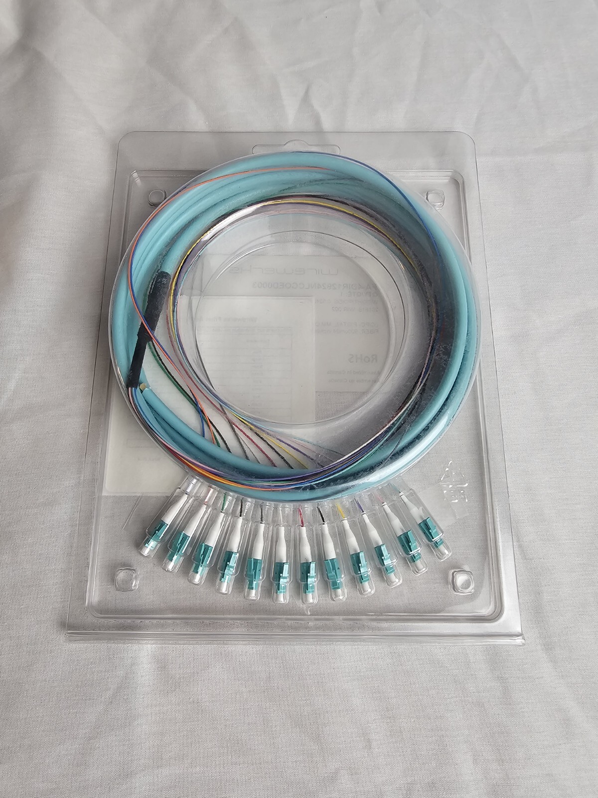 Wirewerks LC/PC Pigtail Multimode OM3 OFNR 12 Fiber 900um 24" Legs 3 Meters