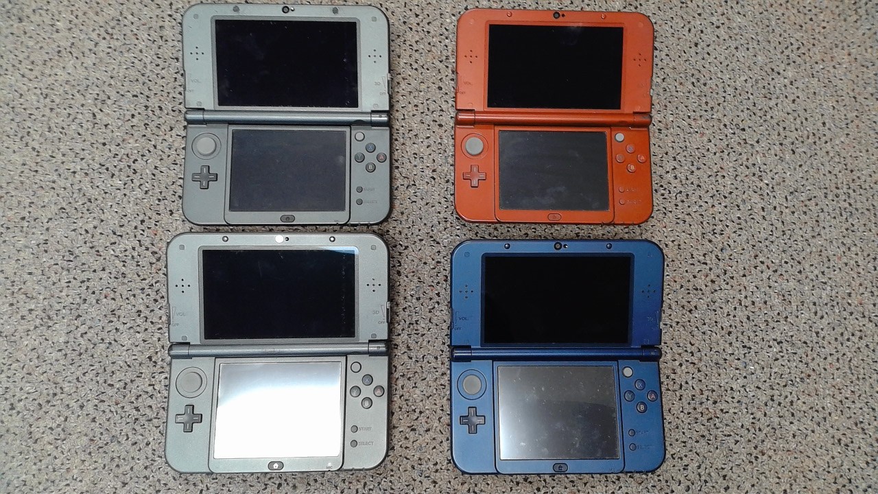 Lot of 4 Nintendo 3DSXL RED-001 for Parts or Repair