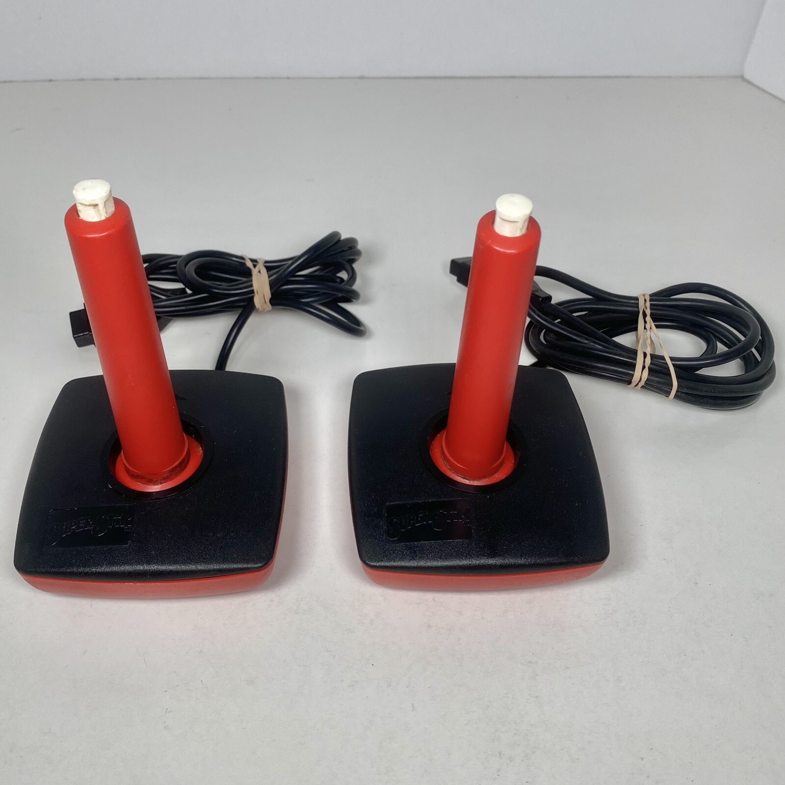 Super Stik Vintage Pair of 2 Red Joystick Controllers For Atari 2600 Commodore