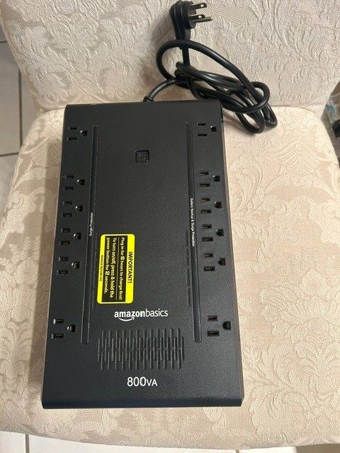 AmazonBasics 800VA 450W UPS Battery Backup Surge Protector 12 Outlets Black