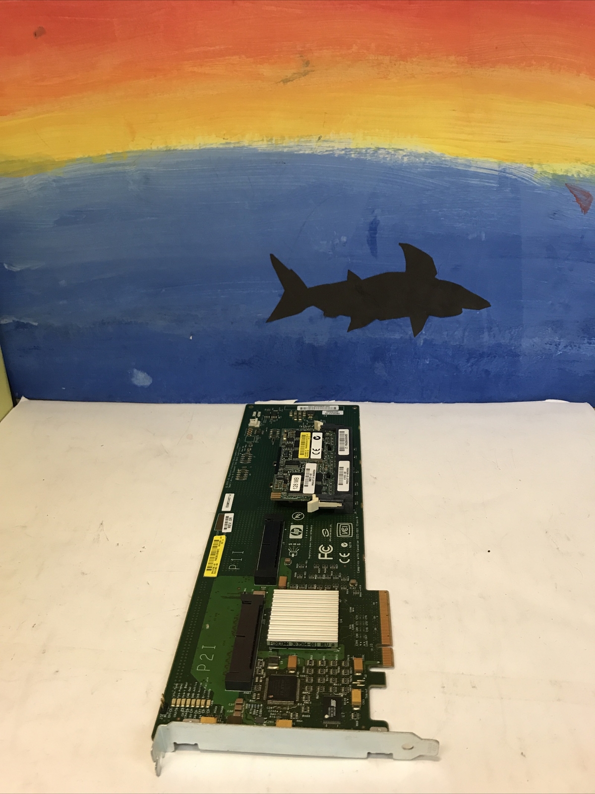 HP Smart Array E200/128 BBWC PCI-E SAS Raid Controller 411508-B21/412799-001