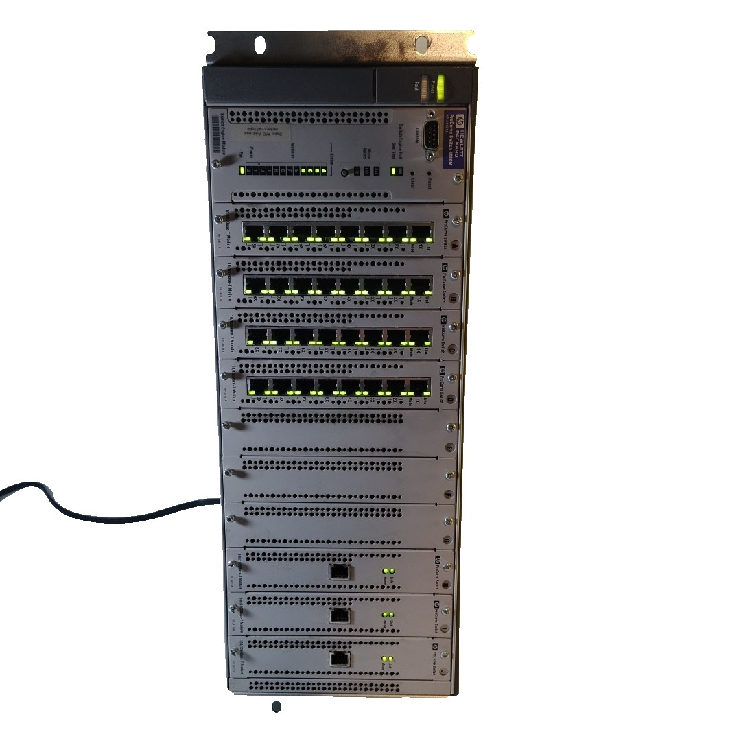 HP J4121A PROCURVE SWITCH 4000M w/ 4x J4111A & 3x J4115B Modules
