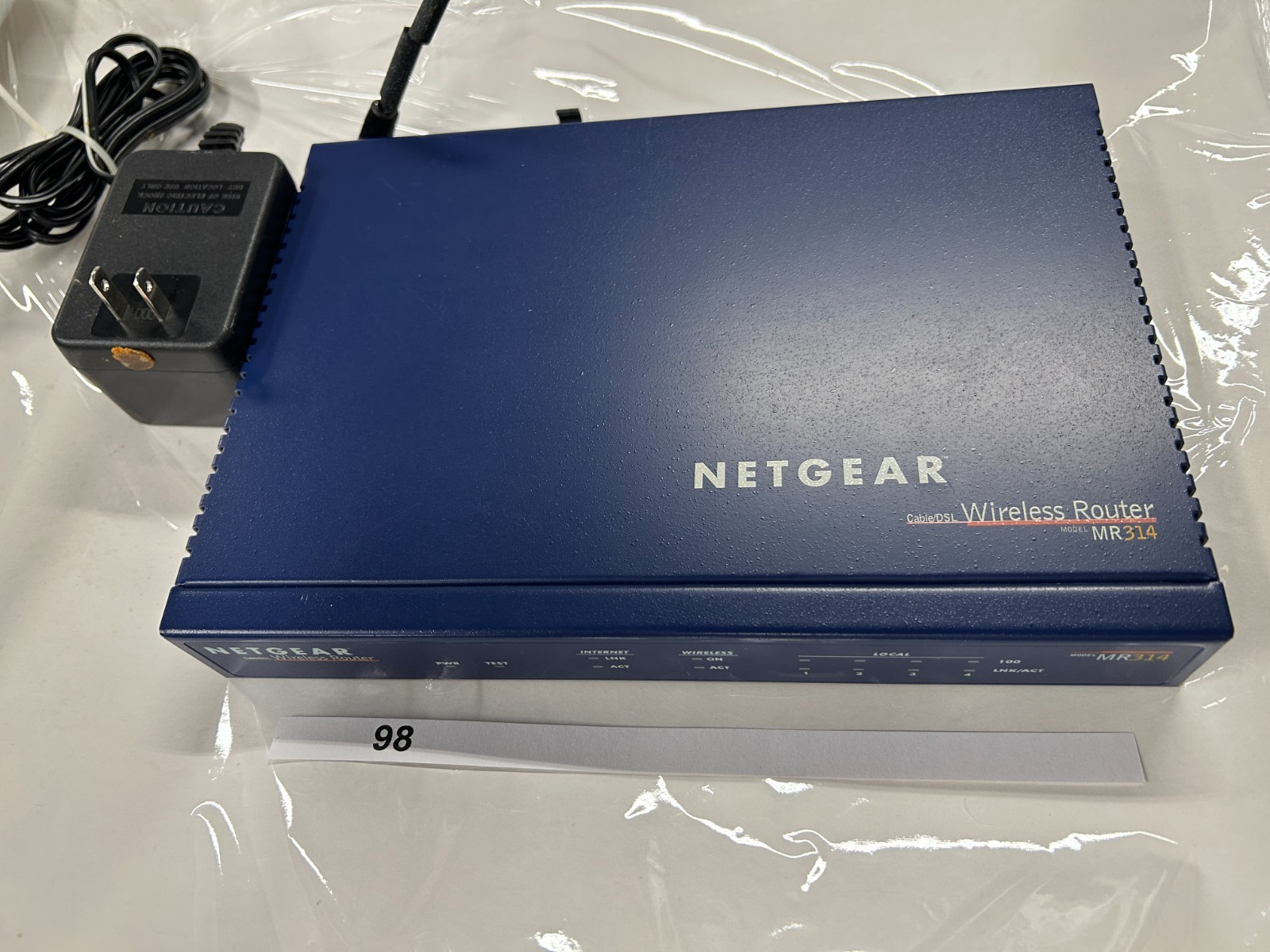 Netgear Cable/DSL Wireless Router MR314 with 4-Port Switch Kit - W/Adapter