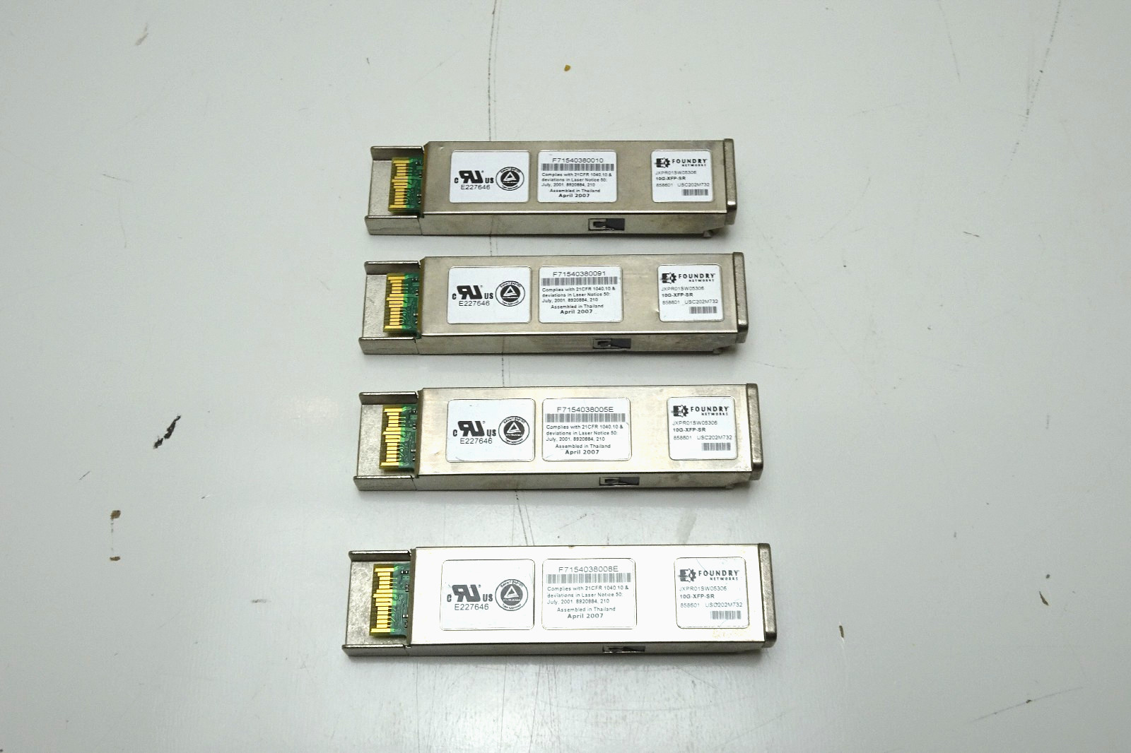 Lot of 4 Foundry Transceiver Modules | JXPR01SW05306 10G-XFP-SR | UNTESTED