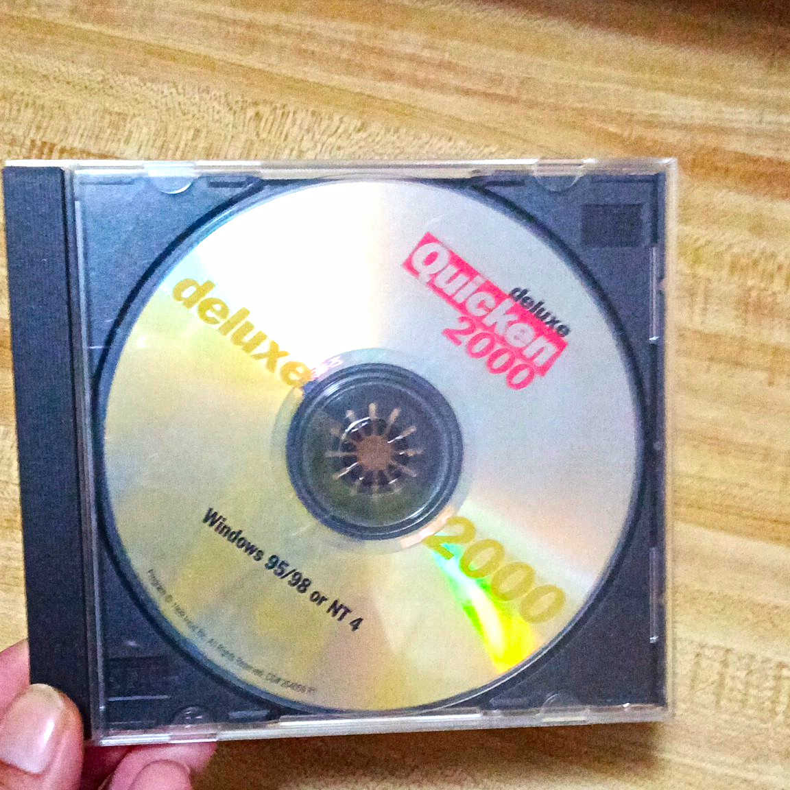 Quicken Deluxe 2000 Personal Finance CD for Windows 95/98/NT 4