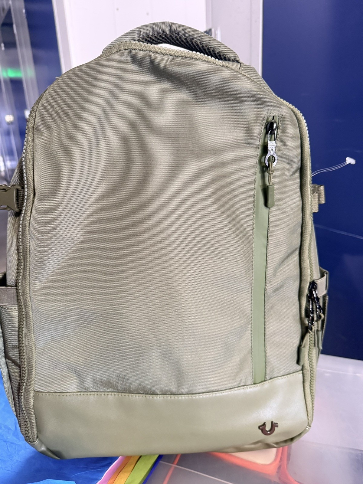 True Religion Dome Backpack in olive green.