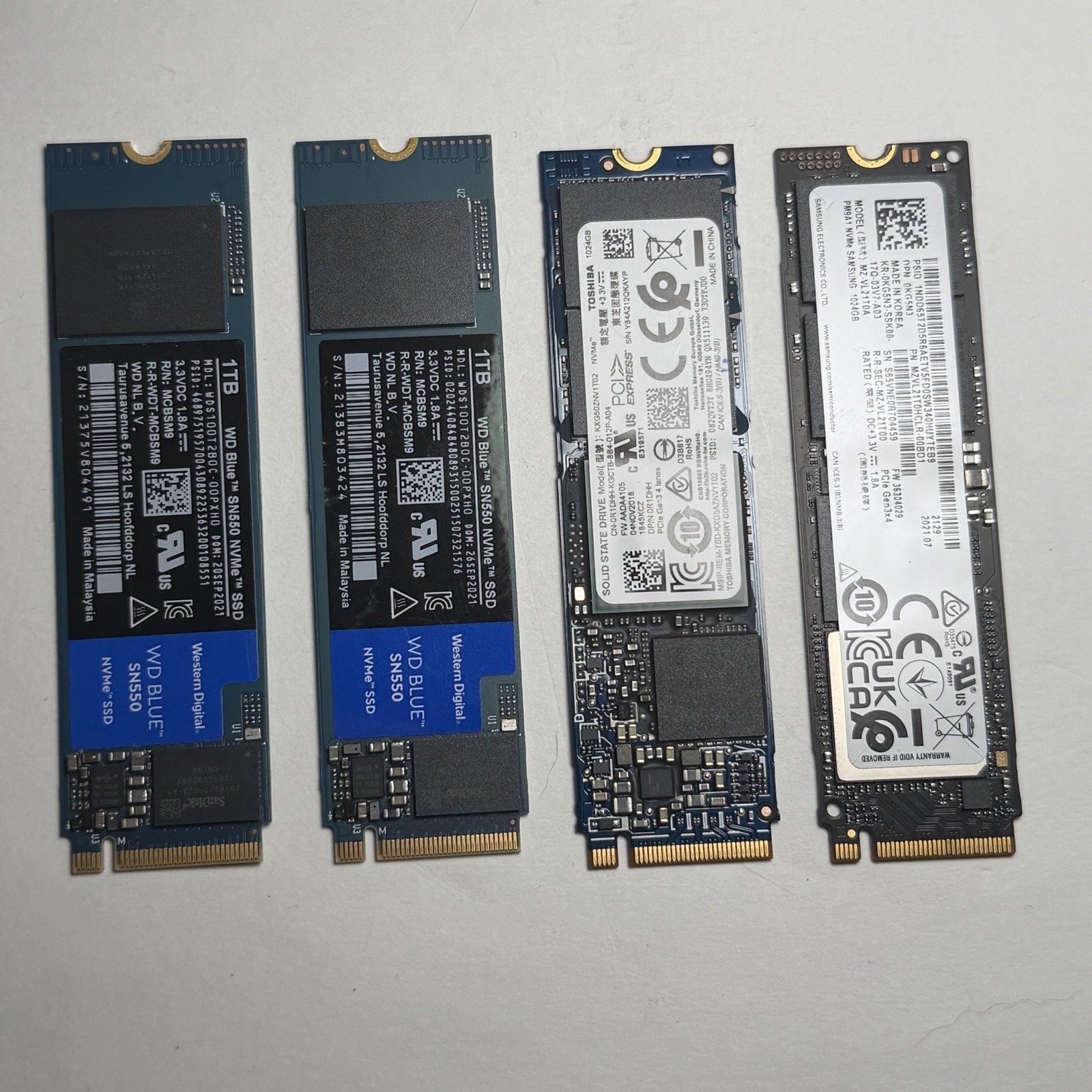 Lot of 4 1TB M.2 2280 NVMe PCIe SSDs WD Blue SN550 Samsung PM9A1 Toshiba XG6