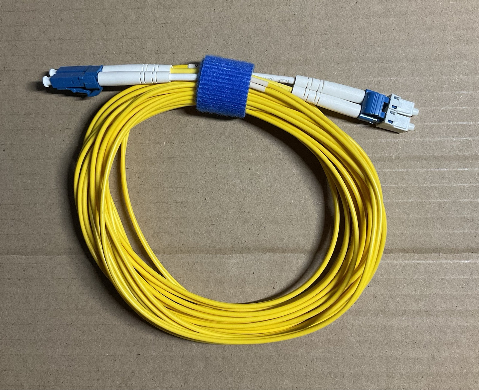 9' Plus Corning Fiber LC to LC  201404 SMF-28e+LL OFNR