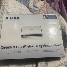 D-Link WiFi Bridge/Access Point, Model DAP-1522, Power Adapter and original box picture