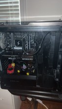 Digital storm lumos gaming set up. Comes with 2 gaming monitors, mouse, keybrd  picture