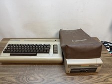 VINTAGE COMMODORE 64 1541 DISK DRIVE COMPUTER LOT FOR PARTS POWERS ON picture