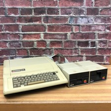 Vintage Apple IIe Computer A2S2064 (Powers On) w/Floppy Disk Drives Retro Gaming picture