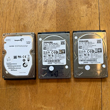 Lot of 3 1TB 2.5” SATA Hard Drives Toshiba Seagate Untested Parts Repair picture