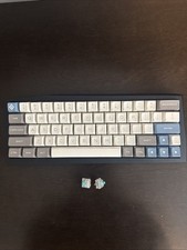 Custom keyboard With Teal Switches and Polycarbonate Plate. picture
