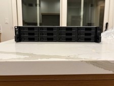 Synology RackStation RS2421+ 12-Bay Rackmount Diskless NAS and racking system picture