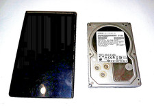 2 USED, HITACHI AND CAVALRY 2TB INTERNAL AND EXTERNAL HARD DRIVES. YOU GET BOTH picture