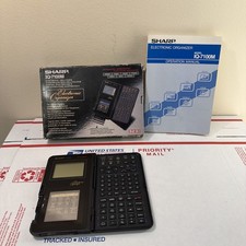 Vintage ELECTRONIC ORGANIZER SHARP IQ-7100 Multilingual Made in JAPAN Box picture