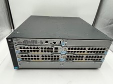 HP PROCURVE J9850A NETWORK CHASSIS w/ J9827A, 3X J9534A AND J9536A picture