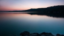 Landscape mountains rocks lake colorful sky switzerland Custom Gaming Mat Desk picture