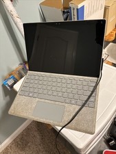 Microsoft Surface Pro 4 PC Tablet 1724 works fine but small crack on screen picture