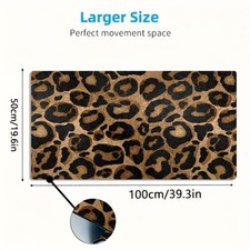 A Large Gaming Mouse Pad Featuring a Golden And Black Leopard Print Design, wi picture