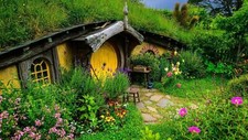 Landscape nature house new zealand hobbiton door trees Custom Gaming Mat Desk picture