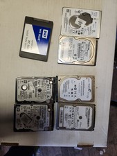 7 Laptop Hardrives  Parts. 1-SSD, 1-1TB, 4-500GB, 1-750GB picture