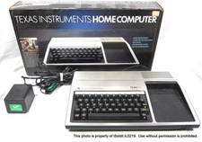 Vintage TEXAS INSTRUMENTS HOME COMPUTER 99/4A in Original Box w/ Controllers + picture