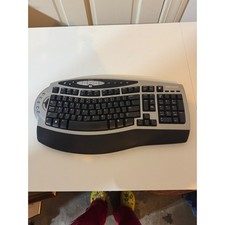 Microsoft Wireless Comfort Keyboard 4000 Model 1045 Ergonomic Silver Black picture
