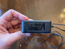 Netgear DSA-12R-12AUS 332-10006-01 12V 1A Switching AC Adapter NEW 30-5 USED picture